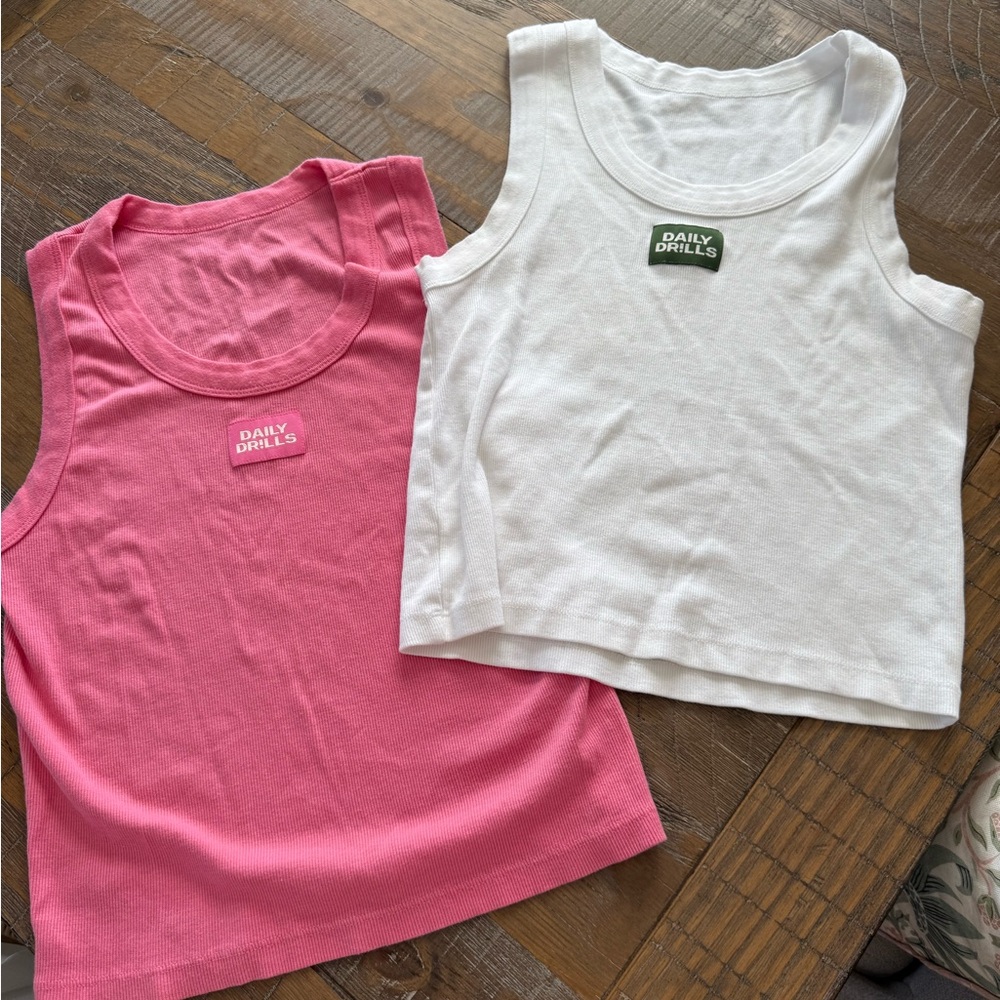 Daily drills EUC logo ribbed tanks!!  Monochrome cheeks tank and white tank!